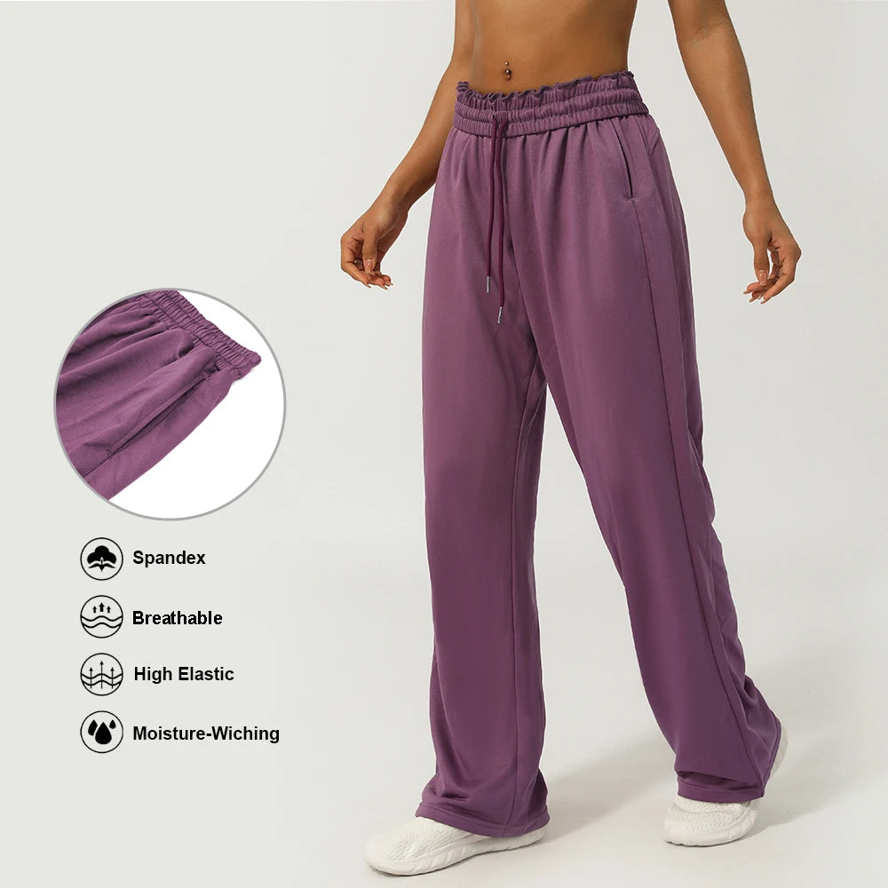 Calça Esportiva Feminina Cintura Alta com Bolso Lateral Perna Larga para Corrida Treino e Academia