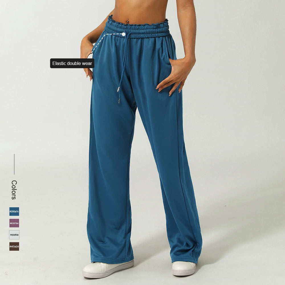 Calça Esportiva Feminina Cintura Alta com Bolso Lateral Perna Larga para Corrida Treino e Academia