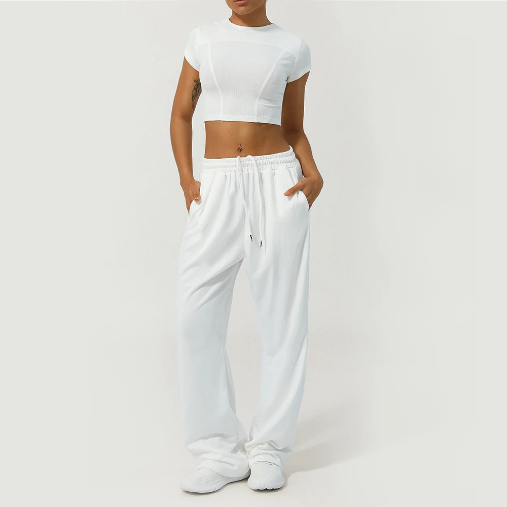 Calça Esportiva Feminina Cintura Alta com Bolso Lateral Perna Larga para Corrida Treino e Academia