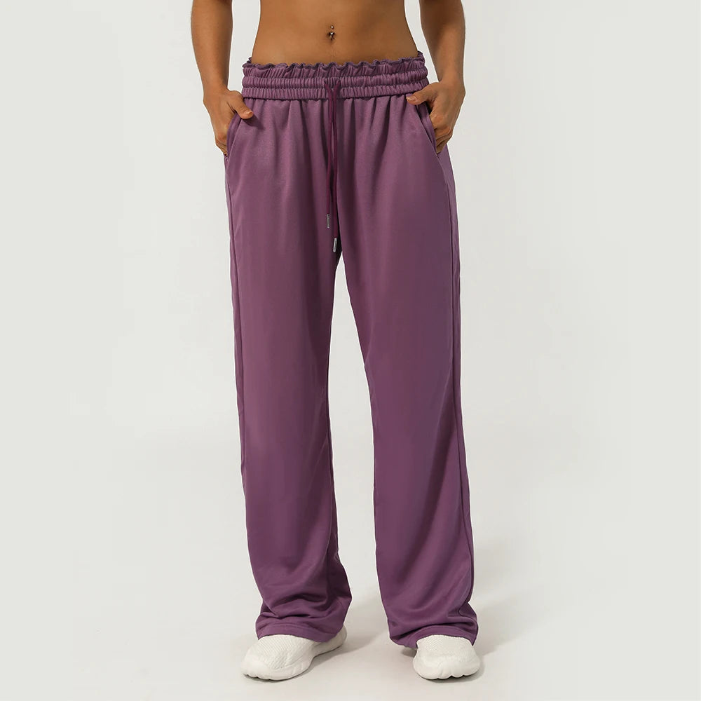 Calça Esportiva Feminina Cintura Alta com Bolso Lateral Perna Larga para Corrida Treino e Academia