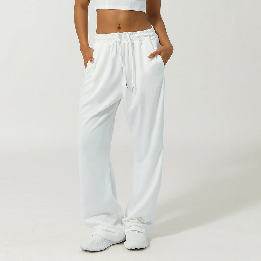 Calça Esportiva Feminina Cintura Alta com Bolso Lateral Perna Larga para Corrida Treino e Academia